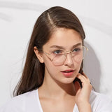 clip-on eyewear, magnetic sunglasses, minimal clip-on glasses, premium optical frames, prescription glasses, modern eyewear, designer eyewear, contemporary eyewear, lightweight eyewear, luxury minimal eyewear