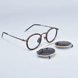 clip-on eyewear, magnetic sunglasses, minimal clip-on glasses, premium optical frames, prescription glasses, modern eyewear, designer eyewear, contemporary eyewear, lightweight eyewear, luxury minimal eyewear